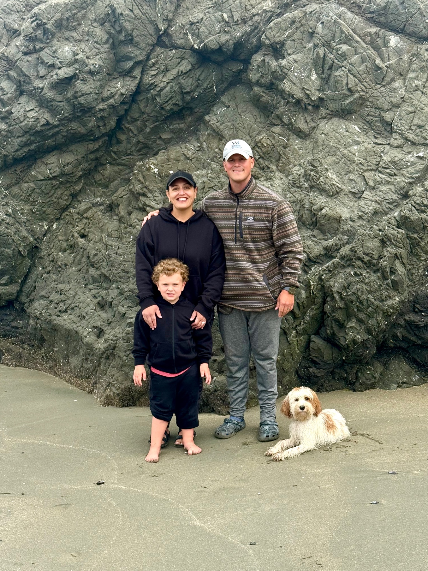 The True Line K9 Academy family with Rico at the beach